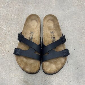 Birkenstock Black and Tan Cross-Strap Sandals